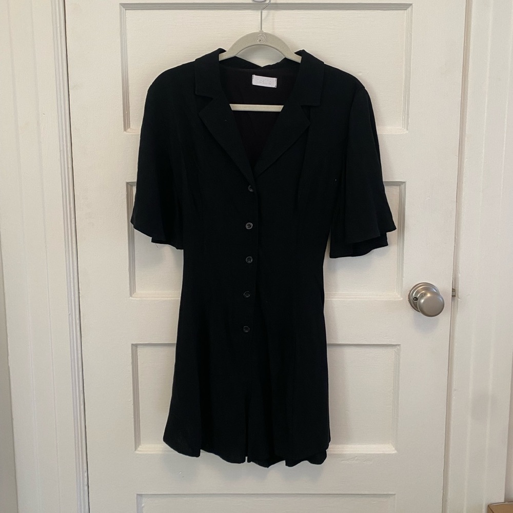Black short sleeve romper with buttons